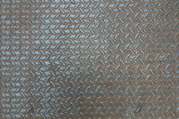 Rusted anti-slip floor panel, metal background with texture