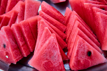 Directly above shot of watermelon slices in plate  - Powered by Adobe