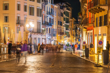 Shopping street in downtown Verona city, cityscape of Italy - 750378035