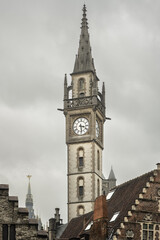 Fototapeta na wymiar Gent in Belgium. Clock tower in the city center.