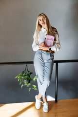 Stylish beautiful woman businessman with laptop