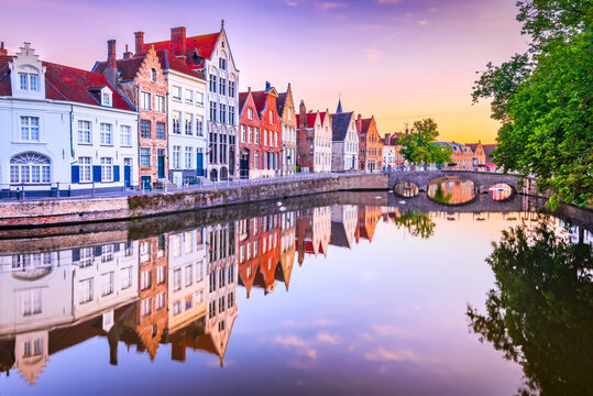 Bruges, Belgium. Sunrise over Spiegelrei Canal, Flanders cityscape