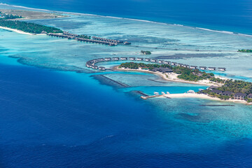 Maldives paradise island resort. Tropical aerial landscape, seascape yacht with water bungalows...