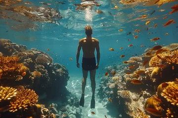 Papier Peint photo autocollant Récifs coralliens Caucasian man in a mask swims on a coral reef