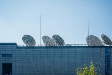 Satellite receiver on top of the building