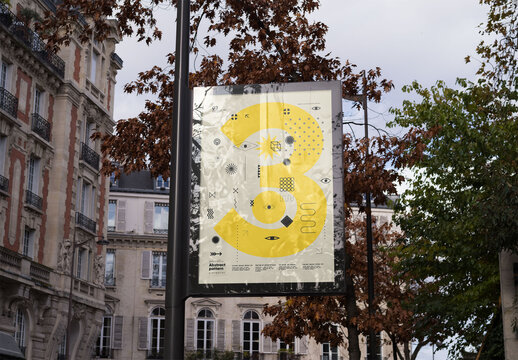 Mockup of customized vertical sign on lamp post
