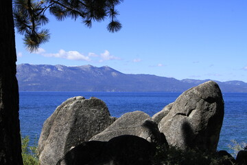  California Lake Tahoe with blue water and rocks