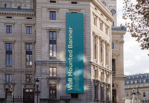 Mockup of customizable vertical banner on building