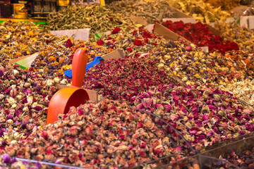 Close-up of colorful herbal tea at the bazaar, selective focus. Various types of tea and spices at...