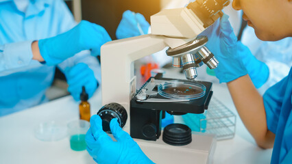 Laboratory tests with a team of people, ensuring precision and accuracy in scientific experiments...
