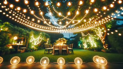outdoor party scene at dusk with string lights crisscrossing above a backyard