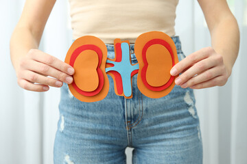 Kidneys in human hands, concept for national kidney day.