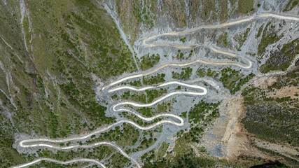 Aerial view of curving road on high altitude mountain, China