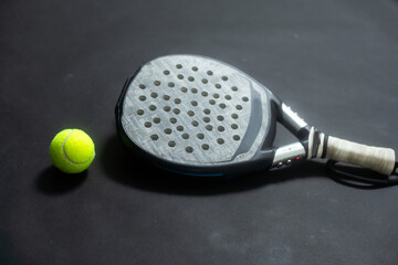 ball racket paddel black background