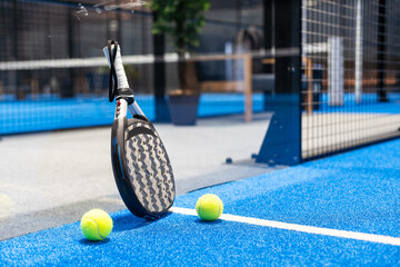 Paddle objects on blue turf