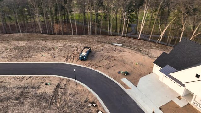 Aerial view of a newly built home near the completion date.