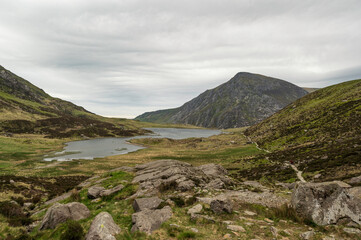 Dramatic landscape vista of Cwm Idwal in the Gyderau mountains of Snowdonia National Park in North Wales