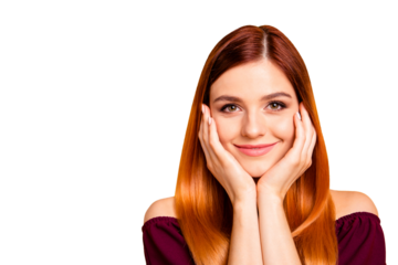 Portrait of red straight-haired attractive cute nice happy smiling young girl, hands touching cheeks. Copy space. Isolated over bright vivid yellow background