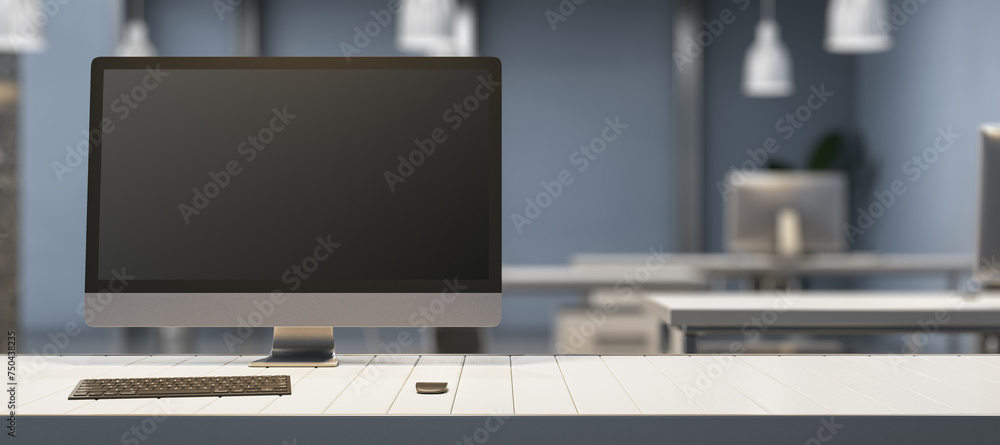 Poster Creative designer table with empty mock up computer display, supplies and blurry office interior in the background. 3D Rendering.