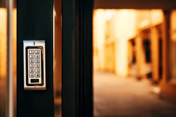 Fotobehang Keypad door lock at residential building entrance © Bits and Splits