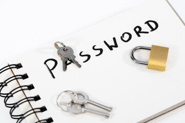 Napis password i kłódka z kluczami leżą na notesie - obrazy, fototapety, plakaty