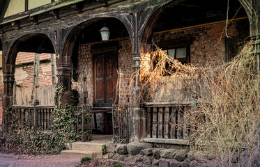 Porch of ancient abandoned village house