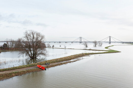 Netherlands, Aerial view of river Waal flooding surrounding land after prolonged rainfall