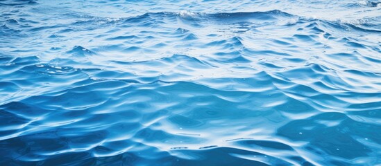 Tranquil Blue Ocean with Gentle Waves and a Distant Boat Sailing on the Horizon
