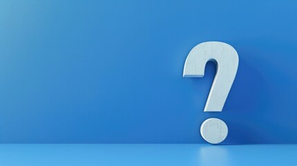 Simple and clear image of a white question mark on a blue background. Suitable for various design projects