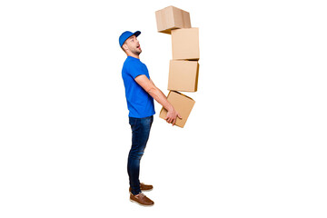 Full body length size, side profile view of handsome scared, shocked bearded deliver in uniform holding four large big flying up in air boxes in arms, isolated over bright vivid yellow background