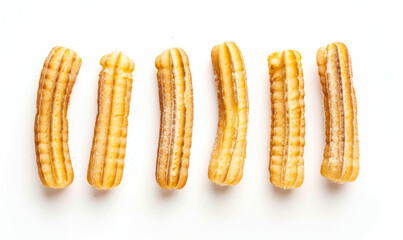 Churros straight and evenly spaced, top-down view isolated on white background. Spanish dessert concept. Design for bakery and sweet treat themes