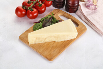Piece Italian hard parmesan cheese