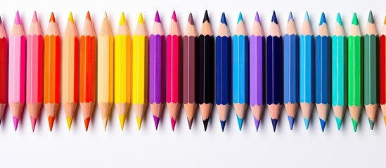 Vibrant Rainbow Colored Pencils on White Background, Creativity and Inspiration Concept