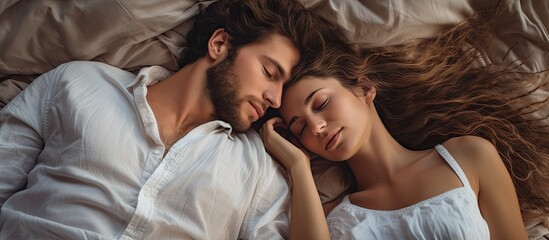 Fototapeta na wymiar Intimate Moment: Couple Embracing and Sleeping peacefully in Bed