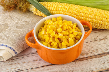 Canned yellow corn in the bowl