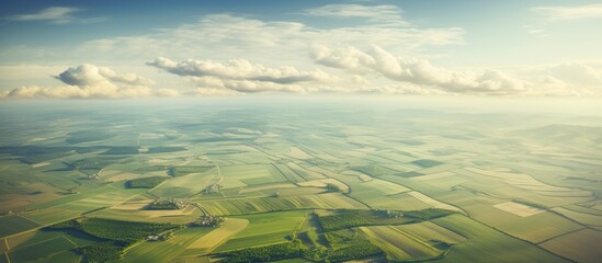 Scenic Panorama of Vast Cropland under an Expansive Sky