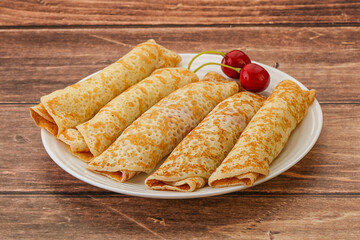 Sweet and tasty pancake with cherry