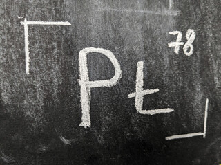 The chemical element is platinum with a serial number from the periodic table. Chalk drawing.