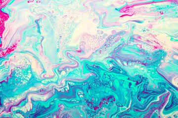 Fototapeta na wymiar Artistic background of mixed paint fluids