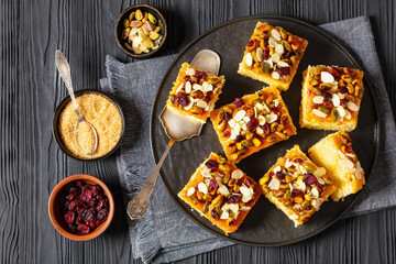 slices of yogurt cake with nuts and dried berries