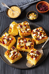 slices of yogurt cake with nuts and dried berries