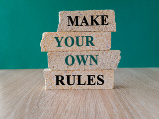 Make your own rules symbol. Concept green words Make your own rules on brick blocks. Beautiful...