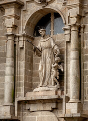 Religious statue on a house in Santiago de Compostela