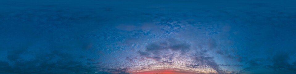 Sunset sky panorama with bright glowing pink Cumulus clouds. HDR 360 seamless spherical panorama....