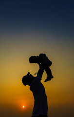 Family, silhouette and sunset by beach with dad lifting child in air to fly while on vacation in summer with love, care and support outdoor. Man and kid playing airplane while holiday on sea beach. 