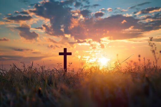 a cross standing in the field at sunset,, Easter theme, Good Friday