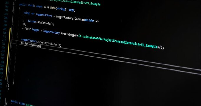 hacker programmer writes malicious code on laptop, cyber security concept