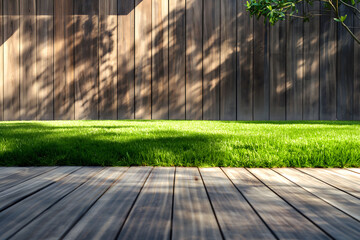 wood deck and grassy area with wooden fences - Powered by Adobe