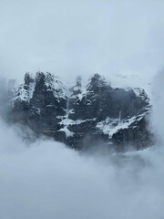 Obraz na płótnie Canvas Cloud on the frozien mountains