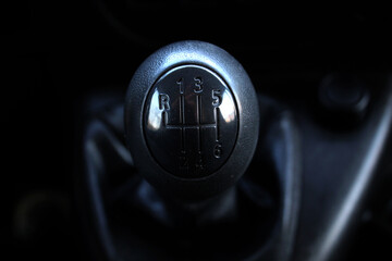 Close up Manual gear shifter. Manual gearbox handle in the car. Six speed manual shift car gear...